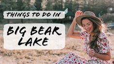 a woman sitting on the ground wearing a hat and dress with words that say, things to do in big bear lake