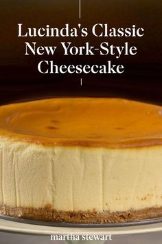 a cheesecake on a plate with the words, lucia's classic new york style cheesecake