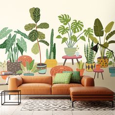 a living room filled with lots of plants and potted plants on top of a wall