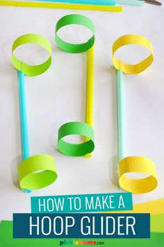 how to make a hoop glider with paper strips and scissors on the bottom half