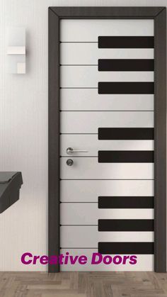 an open door with the words creative doors on it in front of a piano keyboard