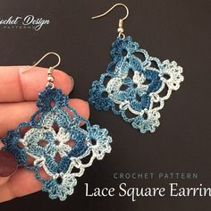 crochet pattern lace square earrings in blue, white and gray colors on black background