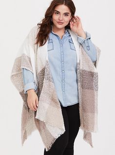 Soft and oversize, this plaid knit ruana is comparable to a blanket with a fringe trim adding slight movement. Open front. Wrap sleeves let you style it a variety of ways. Fringe trim. CONTENT + CARE: Polyester. Hand wash; line dry. Imported plus size wrap. SIZE + FIT: Model is 5'8”. The best plus size women's ivory multicolor plaid ruana capes ponchos & ruanas in multi. Torrid is your destination for cozy fall and winter clothes to keep you warm and comfortable. Long Statement Earrings, Cowl Neck Poncho, Capes & Ponchos, Plaid Blanket Scarf, Fitted Wedding Dress, Oversized Scarf, Football Tees, Nagoya, Scalloped Lace