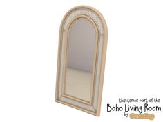 an oval shaped mirror sitting on top of a white wall next to a wooden frame