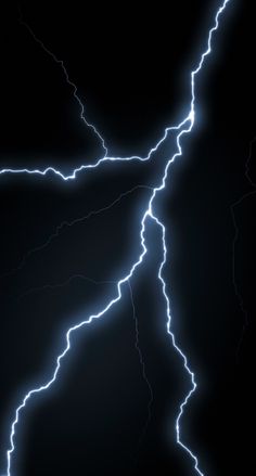 lightning strikes across the night sky with long exposure