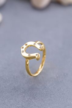 ★14K Solid Gold Horseshoe Ring, 925 Sterling Silver Horseshoe Ring, Horseshoe Star Ring, Star Ring, Mother's Day Gift, Valentine's Day Gift★ ▷ MATERIAL ★ All of our 10K, 14K, 18K Jewelry are Solid Gold. ( Not Gold Filled or Gold Plated ) ★ All of our silver jewelry is 925 sterling silver and 14 carat gold plated. (Our white silver jewelry is rhodium plated.) ▷ PRODUCTION AND PACKAGING ★ Our jewelry is handmade. It is specially prepared for you in the dimensions you want upon order. ★ We work wit Elegant Gold Horseshoe Rings, Luxury Gold Horseshoe Jewelry, Adjustable Gold Horseshoe Jewelry, Luxury Gold Horseshoe-shaped Jewelry, Horseshoe-shaped Yellow Gold Jewelry Gift, Horseshoe Ring, Wooden Jewelry Boxes, Star Ring, Surprise Gifts