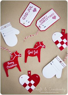 red and white paper cutouts with christmas sayings on them are laid out next to each other