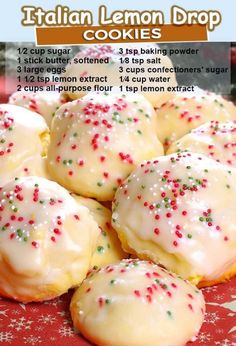 italian lemon drop cookies with white icing and sprinkles on a red plate