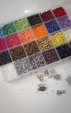 PRICES MAY VARY. Package includes twenty-four different colors pony glass seed beads, 2 Beading needles-tweezer on side of container-two rolls of string as well as an assortment of charms-rings-clasps and things in a plastic box for bracelet, necklace and jewelry making. High quality opaque Matte glass seed beads also called Japanese seed beads, size of beads are almost uniform, Vibrant Colors: green, blue, red, yellow, black, white, and more; About 200 pieces each color; enough and vibrant to m String For Bracelets, Diy Wire Bracelet, Easy Origami Flower, Diy Kandi Bracelets, Homemade Bracelets, Birthday Freebies, Bracelet Kit, Diy Jewelry Unique, Bead Jewellery Supplies