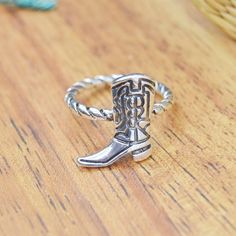 Silver Cowboy Boot Ring

Cute rodeo western themed band featuring a twisted design!

-Size 7.5, only one available 
-Steel
-0.7” height

32C Country Accessories, Country Rings, Cowboy Boot, Ring Color, Women Accessories Jewelry, Womens Jewelry Rings, Cute Fits, Rodeo, Cowboy Boots