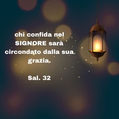 a lantern hanging from the side of a building with words written below it that read, chi confida ne signore sara circondaato dala alla su grati