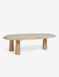 an oval wooden table with two legs on the top and one leg extended to the side