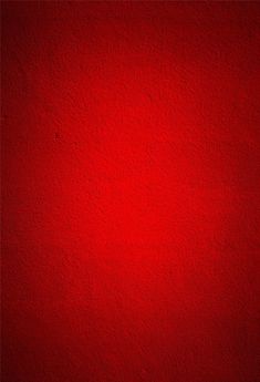 a red wall that is very bright and dark