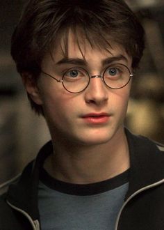 harry potter in glasses looking at the camera