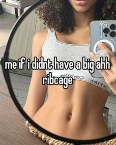 a woman taking a selfie in front of a mirror with the caption me if i didn't have a big ahh rib cage