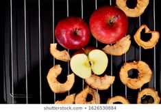 apples and onion rings are on the grill