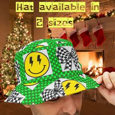 Introducing our vibrant Checkered Bucket Hat, the ultimate Smiley Face Festival Hat that doubles as a Rave Y2K Fashion Accessory and Music Lover Gift. This Lightning Bolt Streetwear Hat combines Retro 90s style with modern flair, making it the perfect Outdoor Concert Hat for fashion-forward individuals seeking a statement piece. STAND OUT IN STYLE WITH OUR VERSATILE CHECKERED BUCKET HAT  * Eye-catching design featuring a green checkered pattern, yellow smiley faces with lightning bolt eyes, and Checkered Bucket Hat, Rave Y2k, Streetwear Hats, Yellow Smiley Face, Retro Looks, Festival Hat, Streetwear Mode, Outdoor Concert, Large Hats