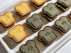 there are many cookies that have been made to look like toasted breads with faces on them