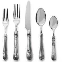 an assortment of silverware including forks, knives and spoons on a white background