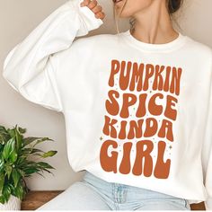 Pumpkin Spice Sweatshirt, Fall Sweatshirt, Cozy Sweatshirt, Autumn Sweatshirt, Girly Fall Apparel, Pumpkin Spice Lover, Cute Fall Outfit, Ideal For Any Situation, A Unisex Heavy Blend Crewneck Sweatshirt Is Pure Comfort. These Garments Are Made From Polyester And Cotton. This Combination Helps Designs Come Out Looking Fresh And Beautiful. The Collar Is Ribbed Knit, So It Retains Its Shape Even After Washing. There Are No Itchy Side Seams On These Sweaters. .: Made With A Medium-Heavy Fabric Blen Trendy White Cozy Fit Top, Cute Text Print Sweatshirt For Fall, Cute Sweatshirt With Text Print And Long Sleeves, Cute Long Sleeve Sweatshirt With Text Print, Fall White T-shirt For Loungewear, White Letter Print Cozy Top, Cozy White Tops With Letter Print, Cozy White Graphic Print T-shirt, Cute White Fall Sweatshirt