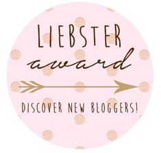 a pink and gold badge with the words liebster award