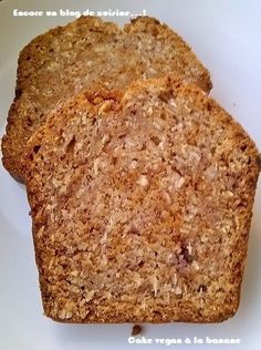 two pieces of bread sitting on top of a white plate