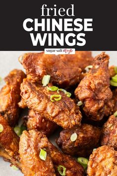 fried chinese wings with sesame seeds on top and the title overlay reads fried chinese wings