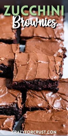 chocolate zucchini brownies cut into squares and stacked on top of each other