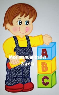 a young boy is playing with blocks in the shape of an abc and letter block