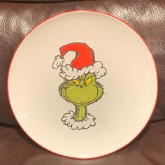 a plate with an image of the grin on it