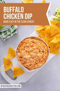 buffalo chicken dip made in the slow cooker with tortilla chips and celery