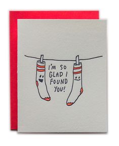 a card with two socks hanging on clothesline saying i'm so glad i found you