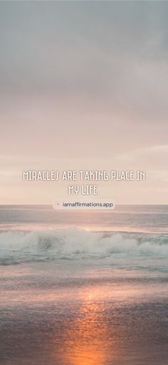 there is a quote on the beach that says, miracles are taking place in my life