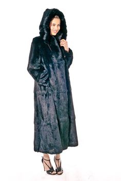 Hooded Black Rabbit Fur Coat-Plus SizeHooded Black Rabbit Coat Contents: Dyed Black Rabbit. Length: 52" . Side Seam Pockets. Fur Origin: China. Available in sizes 6 - 22. Also available in White.$1,995.00 $1,095.00https://www.madisonavenuemalls.com/shop/furs/rabbit/rabbit-coat/hooded-black-rabbit-fur-coat-plus-size/