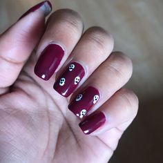 27. Burgundy Skulls Sophisticated Manicure, Halloween Nail Ideas