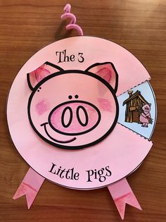 a paper plate with a pig's face on it and the words, the 5 little pigs