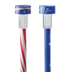 two red, white and blue toothbrushes are next to each other on a white background