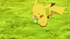 pikachu running through the grass with an apple in his hand and another pokemon character behind him