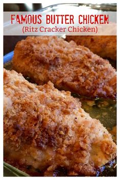 two pieces of chicken sitting on top of a pan