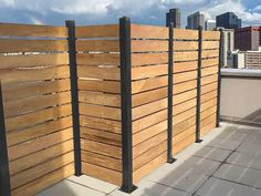 a wooden fence on top of a building