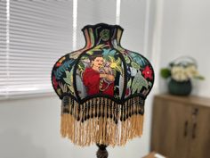 "💗 Hello,welcome to my shop..Please contact me if you need a light with lampshade. Frida's Garden lampshades, Vintage /Retro Lampshade For Table Lamp / Floor Light, Luxury Lamp Shades (E27/E14) 💗 💗 Size： 1-Lampshade:7 * 14 *9 inches ( 7\" Top x 14\" Bottom x 9\" High. 16*35*25cm, Not Including Tassels length) 2-Table Lamp:Lamp Base:Height- 16 inches (40cm),    Table LampBase+Lampshade height is about 26 inches (65cm). 3-Lamp Base:height-55 inches,(140cm ),    Floor LampBase+Lampshade height is about 65 inches( 165cm). 💗💗Fit for E27(40mm Hole)/E14(29 mm Hole) Light Socket or 10.5mm round hole sockets Custom lamp shades service is avalible ,please contact me .thank you . 💗 💗 Materials： Lampshade:Metal，Fabric Table Lamp Base:Copper Lamp Base:Metal with Copper plating 💗What pakcage inc Luxury Lamp, Lace Lamp, Diy Table Lamp, Retro Lampshade, Custom Lamp Shades, Green Lamp Shade, Retro Table Lamps, Victorian Lampshades, Luxury Lamps