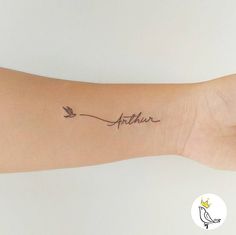 a woman's arm with a tattoo that reads, faith and an arrow on it