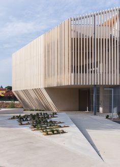 the building is made out of wooden slats