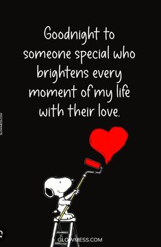 a person on a ladder with a red heart in his hand and the words goodnight to someone special who brightens every moment of my life with love