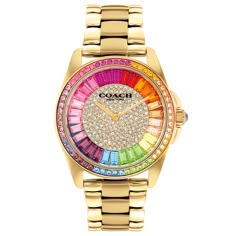 The epitome of refined sophistication, COACH Greyson is a polished, go-everywhere timepiece. This gold-tone bracelet design sparkles with a pave crystal dial accented with bright rainbow-hued pave crystals on the dial, markers and bezel. Gold-tone case and bracelet Approx. case diameter: 36mm Crystal accents Green dial Mineral crystal Quartz movement Deployment closure Water-resistant to 99 feet COACH Style #: 14504274 Fancy Watches, Bright Rainbow, Girly Accessories, Jewelry Fashion Trends, Bracelet Design