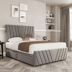 a bed sitting in a bedroom on top of a hard wood floor