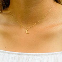 The moon is widely believed to be a feminine symbol, bringing immortality and eternity. Perfect gift idea for girlfriends, sisters or best friends! Choose between several lengths and we will make this necklace with care.…………………………………. Details: Size Small Moon: measures 10 x 8.5mm, Large Moon: 14.5mm x 12mm Pendant is Gold or Silver Plated Chain is 14k Gold Filled or Sterling Silver Average necklace length is 18" About Your Jewelry If you are not wearing your jewelry it is best to store it in a c Sterling Silver Moon Phase Charm Necklaces, Sterling Silver Moon Phase Necklace, Elegant Moon Shape Clavicle Chain Necklace, Round Pendant Jewelry With Moon Phase, Moon Phase Charm Necklace, Moon Phase Round Charm Necklace, Dainty Moon Charm Necklace For Wedding, Celestial Moon Charm Jewelry As Gift For Her, Adjustable Moon Clavicle Chain Jewelry