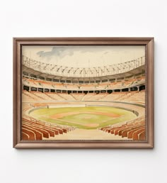 a baseball stadium with an empty field in the middle is framed by a wooden frame