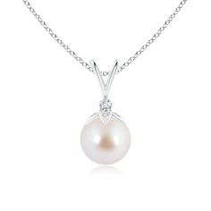 Hanging from a V-bale, the peg-set round Akoya cultured pearl allures with its classic white color. Right below the bale sits a prong-set diamond accent that adds to the beauty of this drop pearl pendant. Be it your formal or casual outfits, this 14K white gold single pearl pendant is all you need to add a hint of subtle elegance to your look. Single Pearl Pendant, Single Pearl, Ball Drop, Akoya Pearls, Cultured Pearls, Pearl Pendant, Classic White, Prong Setting, White Color