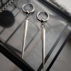 Super long silver spike huggie hoop earrings in silver! Unisex Sold as a pair.  Hoops measure 17mm of stainless steel so are hypoallergenic. Spikes are made of iron alloy and measure 49mm in length.  Please don't hesitate to contact me with any queries or suggestions ☺️  Comes gift wrapped 🖤 Earrings Mens, Earrings Men, Earrings Punk, Hoop Earrings Large, Earrings Gothic, Punk Emo, Gothic Earrings, Spike Earrings, Large Hoop Earrings